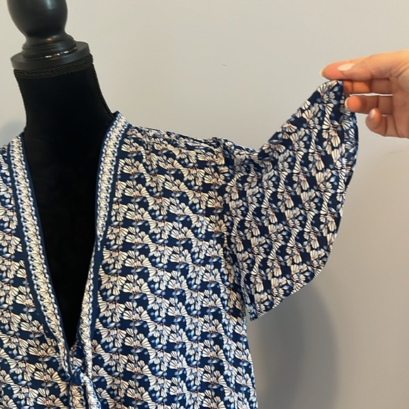 Light and airy ruffle sleeve short sleeve blouse. Deep b neck with self tie - Picture 3 of 7